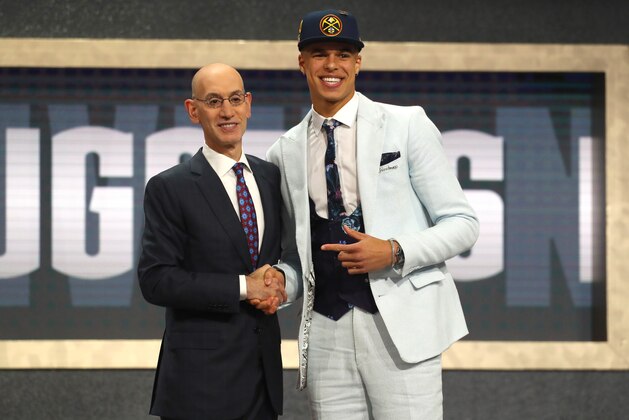 NEW YORK, NY - JUNE 21:  Michael Porter Jr. poses with NBA Commissioner Adam Silver after being drafted 14th overall by the Denver Nuggets during the 2018 NBA Draft at the Barclays Center on June 21, 2018 in the Brooklyn borough of New York City. NOTE TO USER: User expressly acknowledges and agrees that, by downloading and or using this photograph, User is consenting to the terms and conditions of the Getty Images License Agreement.  (Photo by Mike Stobe/Getty Images)