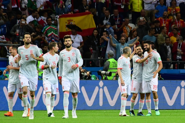 Spain's forward Diego Costa (R) celebrates his goal with teammates during the Russia 2018 World Cup Group B football match between Iran and Spain at the Kazan Arena in Kazan on June 20, 2018. (Photo by Luis Acosta / AFP) / RESTRICTED TO EDITORIAL USE - NO MOBILE PUSH ALERTS/DOWNLOADS        (Photo credit should read LUIS ACOSTA/AFP/Getty Images)