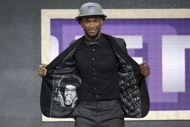 Duke's Marvin Bagley III poses for a picture after he was picked second overall by the Sacramento Kings during the NBA basketball draft in New York, Thursday, June 21, 2018. (AP Photo/Kevin Hagen)