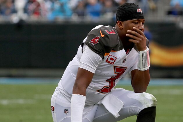 CHARLOTTE, NC - DECEMBER 24:  Jameis Winston #3 of the Tampa Bay Buccaneers reacts between plays against the Carolina Panthers in the fourth quarter during their game at Bank of America Stadium on December 24, 2017 in Charlotte, North Carolina.  (Photo by Streeter Lecka/Getty Images)
