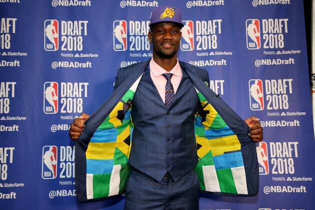 BROOKLYN, NY - JUNE 21:  DeAndre Ayton poses for a photo after being selected number one overall by the Phoenix Suns on June 21, 2018 at Barclays Center during the 2018 NBA Draft in Brooklyn, New York.  NOTE TO USER: User expressly acknowledges and agrees that, by downloading and or using this photograph, User is consenting to the terms and conditions of the Getty Images License Agreement. Mandatory Copyright Notice: Copyright 2018 NBAE (Photo by Chris Marion/NBAE via Getty Images)