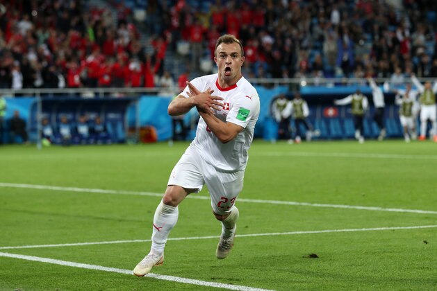 KALININGRAD, RUSSIA - JUNE 22:  Xherdan Shaqiri of Switzerland celebrates after scoring his team's second goal during the 2018 FIFA World Cup Russia group E match between Serbia and Switzerland at Kaliningrad Stadium on June 22, 2018 in Kaliningrad, Russia.  (Photo by Clive Rose/Getty Images)