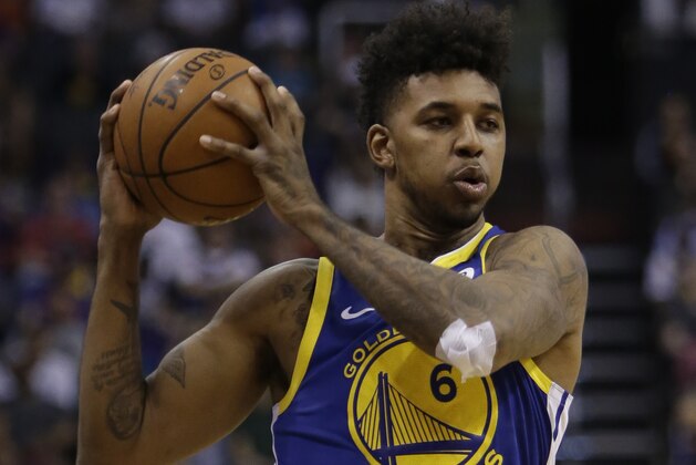 Golden State Warriors guard Nick Young (6) in the second half during an NBA basketball game against the Phoenix Suns, Sunday, April 8, 2018, in Phoenix. The Warriors defeated the Suns 117-100. (AP Photo/Rick Scuteri)