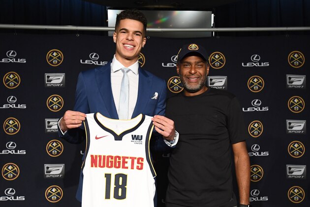 DENVER, CO - JUNE 22: Denver Nuggets draft pick, Michael Porter Jr., poses for a photo with his father during a press conference on June 22, 2018 at the Pepsi Center in Denver, Colorado. NOTE TO USER: User expressly acknowledges and agrees that, by downloading and/or using this photograph, user is consenting to the terms and conditions of the Getty Images License Agreement. Mandatory Copyright Notice: Copyright 2018 NBAE (Photo by Garrett Ellwood/NBAE via Getty Images)