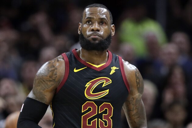 Cleveland Cavaliers' LeBron James looks up at the scoreboard during the first half against the Golden State Warriors in Game 3 of basketball's NBA Finals, Wednesday, June 6, 2018, in Cleveland. (AP Photo/Tony Dejak)