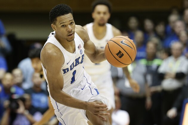 Duke's Trevon Duval (1) dribbles against Louisville during the first half of an NCAA college basketball game in Durham, N.C., Wednesday, Feb. 21, 2018. (AP Photo/Gerry Broome)