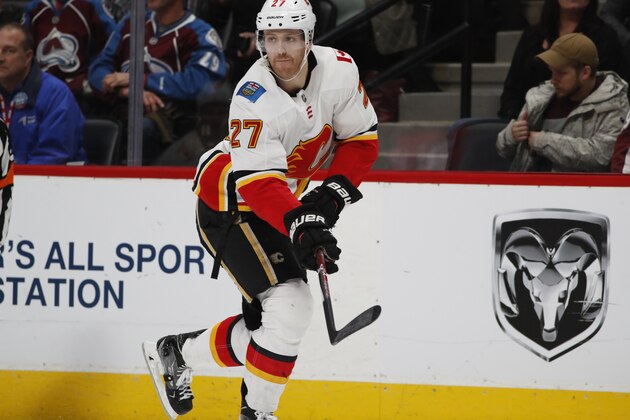 Calgary Flames defenseman Dougie Hamilton (27) in the third period of an NHL hockey game Wednesday, Feb. 28, 2018, in Denver. The Avalanche won 5-2. (AP Photo/David Zalubowski)