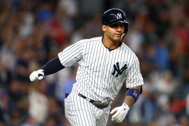 NEW YORK, NY - JUNE 14:  Gleyber Torres #25 of the New York Yankees points to the dugout after hitting a 3-run home run in the fifth inning against the Tampa Bay Rays at Yankee Stadium on June 14, 2018 in the Bronx borough of New York City. New York Yankees defeated the Tampa Bay Rays 4-3.  (Photo by Mike Stobe/Getty Images)