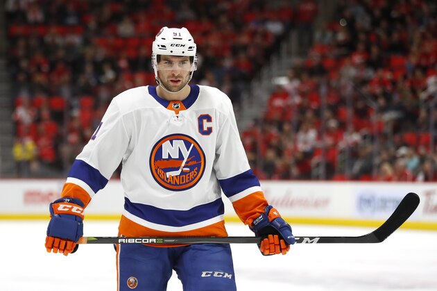 New York Islanders center John Tavares plays against the Detroit Red Wings in the first period of an NHL hockey game Saturday, April 7, 2018, in Detroit. (AP Photo/Paul Sancya)