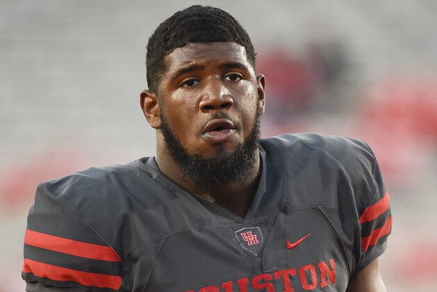 Houston defensive tackle Ed Oliver looks on before an NCAA college football game against Memphis, Thursday, Oct. 19, 2017, in Houston. (AP Photo/Eric Christian Smith)