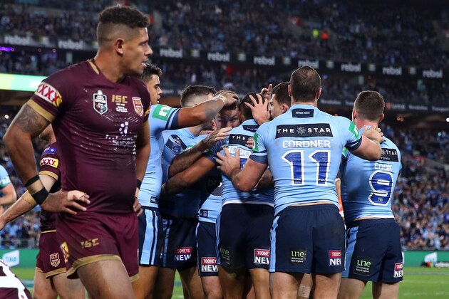 SYDNEY, NEW SOUTH WALES - JUNE 24: Joshua Addo-Carr of the Blues celebrates with team mates after scoring a try during game two of the State of Origin series between the New South Wales Blues and the Queensland Maroons at ANZ Stadium on June 24, 2018 in Sydney, Australia. (Photo by Mark Kolbe/Getty Images) SYDNEY, NEW SOUTH WALES - JUNE 24: Joshua Addo-Carr of the Blues celebrates with team mates after scoring a try during game two of the State of Origin series between the New South Wales Blues and the Queensland Maroons at ANZ Stadium on June 24, 2018 in Sydney, Australia. (Photo by Mark Kolbe/Getty Images)