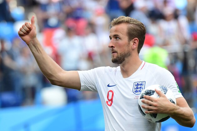 England's forward Harry Kane who scored a hat-trick holds the match ball at the end of the Russia 2018 World Cup Group G football match between England and Panama at the Nizhny Novgorod Stadium in Nizhny Novgorod on June 24, 2018. (Photo by Martin BERNETTI / AFP) / RESTRICTED TO EDITORIAL USE - NO MOBILE PUSH ALERTS/DOWNLOADS        (Photo credit should read MARTIN BERNETTI/AFP/Getty Images)