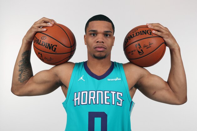 CHARLOTTE, NC- JUNE 22: Miles Bridges #0 of the Charlotte Hornets poses for a portrait during the draft introductory press conference in Charlotte, North Carolina.  NOTE TO USER: User expressly acknowledges and agrees that, by downloading and or using this photograph, User is consenting to the terms and conditions of the Getty Images License Agreement. Mandatory Copyright Notice: Copyright 2018 NBAE  (Photo by Kent Smith/NBAE via Getty Images)