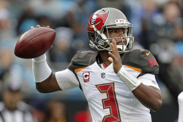 Tampa Bay Buccaneers' Jameis Winston (3) looks to pass against the Carolina Panthers during the first half of an NFL football game in Charlotte, N.C., Sunday, Dec. 24, 2017. (AP Photo/Bob Leverone)
