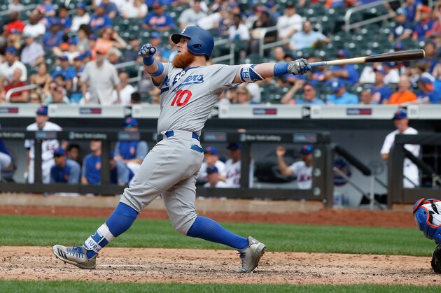 NEW YORK, NY - JUNE 24:  Justin Turner #10 of the Los Angeles Dodgers follows through on his eleventh inning home run against the New York Mets at Citi Field on June 24, 2018 in the Flushing neighborhood of the Queens borough of New York City.  (Photo by Jim McIsaac/Getty Images)