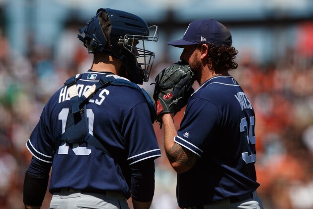 SAN FRANCISCO, CA - JUNE 24: Austin Hedges #18 of the San Diego Padres talks to Kirby Yates #39 during a mound visit against the San Francisco Giants during the eighth inning at AT&T Park on June 24, 2018 in San Francisco, California. The San Francisco Giants defeated the San Diego Padres 3-2 in 11 innings. (Photo by Jason O. Watson/Getty Images)