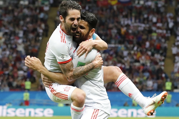 Spain's Diego Costa, right, celebrate after scoring his side's opening goal with Spain's Isco during the group B match between Iran and Spain at the 2018 soccer World Cup in the Kazan Arena in Kazan, Russia, Wednesday, June 20, 2018. (AP Photo/Frank Augstein) Spain's Diego Costa, right, celebrate after scoring his side's opening goal with Spain's Isco during the group B match between Iran and Spain at the 2018 soccer World Cup in the Kazan Arena in Kazan, Russia, Wednesday, June 20, 2018. (AP Photo/Frank Augstein)