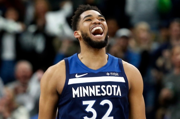Minnesota Timberwolves' Karl-anthony Towns plays against the Houston Rockets in the first half during Game 3 of an NBA basketball first round playoff series Saturday, April 21, 2018, in Minneapolis. (AP Photo/Jim Mone)