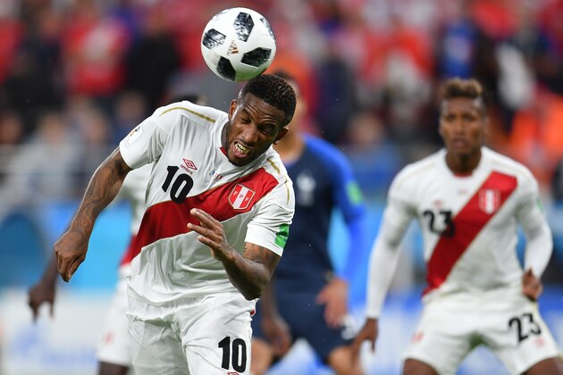 Peru's forward Jefferson Farfan heads the ball during the Russia 2018 World Cup Group C football match between France and Peru at the Ekaterinburg Arena in Ekaterinburg on June 21, 2018. (Photo by HECTOR RETAMAL / AFP) / RESTRICTED TO EDITORIAL USE - NO MOBILE PUSH ALERTS/DOWNLOADS        (Photo credit should read HECTOR RETAMAL/AFP/Getty Images)