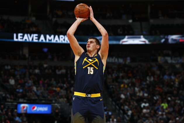 Denver Nuggets center Nikola Jokic (15) in the first half of an NBA basketball game Tuesday, Feb. 13, 2018, in Denver. (AP Photo/David Zalubowski)