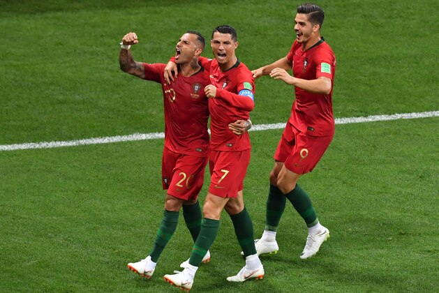 SARANSK, RUSSIA - JUNE 25:  Ricardo Quaresma of Portugal celebrates with teammates Cristiano Ronaldo and Andre Silva after scoring his team's first goal  during the 2018 FIFA World Cup Russia group B match between Iran and Portugal at Mordovia Arena on June 25, 2018 in Saransk, Russia.  (Photo by Hector Vivas/Getty Images)