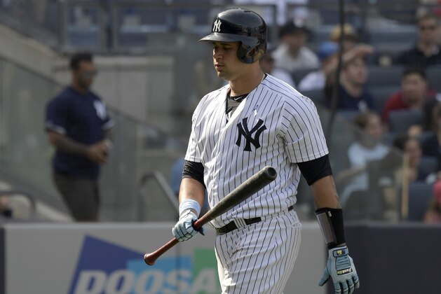 New York Yankees' Gary Sanchez walks back to the dugout after striking out during the eighth inning of a baseball game against the Tampa Bay Rays Sunday, June 17, 2018, at Yankee Stadium in New York. (AP Photo/Bill Kostroun)