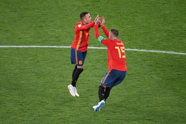 Spain's forward Lucas Vazquez (L) and Spain's defender Sergio Ramos celebrate their second goal after VAR review during the Russia 2018 World Cup Group B football match between Spain and Morocco at the Kaliningrad Stadium in Kaliningrad on June 25, 2018. (Photo by OZAN KOSE / AFP) / RESTRICTED TO EDITORIAL USE - NO MOBILE PUSH ALERTS/DOWNLOADS        (Photo credit should read OZAN KOSE/AFP/Getty Images)