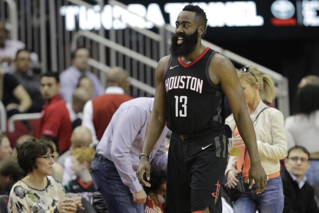 Houston Rockets' James Harden gathers himself after being fouled by Detroit Pistons' Blake Griffin during the second half of an NBA basketball game Thursday, March 22, 2018, in Houston. The Rockets won 100-96 in overtime. (AP Photo/David J. Phillip)