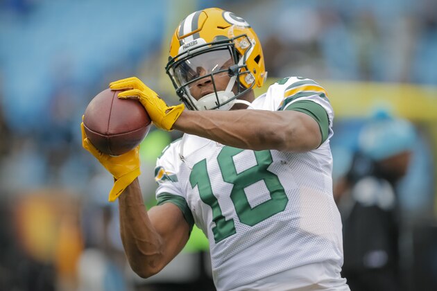 Green Bay Packers' Randall Cobb (18) makes a catch during warm ups before an NFL football game against the Carolina Panthers in Charlotte, N.C., Sunday, Dec. 10, 2017. The Panthers won 31-24. (AP Photo/Bob Leverone)