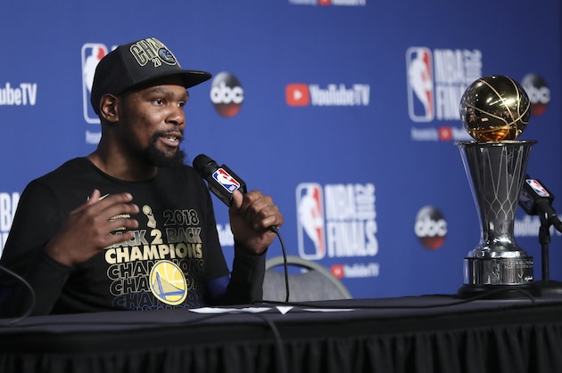 Golden State Warriors forward Kevin Durant speaks during a news conference following Game 4 of basketball's NBA Finals early Saturday, June 9, 2018, in Cleveland. The Warriors defeated the Cleveland Cavaliers 108-85 to take the title. Durant was named MVP of the finals. (AP Photo/Carlos Osorio) Golden State Warriors forward Kevin Durant speaks during a news conference following Game 4 of basketball's NBA Finals early Saturday, June 9, 2018, in Cleveland. The Warriors defeated the Cleveland Cavaliers 108-85 to take the title. Durant was named MVP of the finals. (AP Photo/Carlos Osorio)