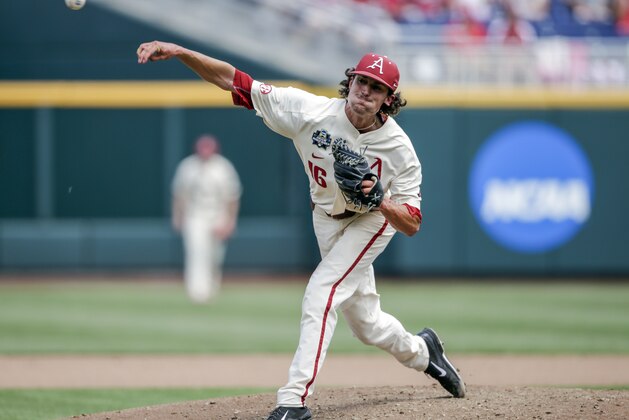 Arkansas pitcher Blaine Knight (16) delivers against Texas in the fifth inning of an NCAA College World Series baseball game in Omaha, Neb., Sunday, June 17, 2018. (AP Photo/Nati Harnik)