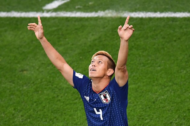 Japan's midfielder Keisuke Honda celebrates a goal during the Russia 2018 World Cup Group H football match between Japan and Senegal at the Ekaterinburg Arena in Ekaterinburg on June 24, 2018. (Photo by Anne-Christine POUJOULAT / AFP) / RESTRICTED TO EDITORIAL USE - NO MOBILE PUSH ALERTS/DOWNLOADS        (Photo credit should read ANNE-CHRISTINE POUJOULAT/AFP/Getty Images)