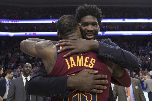PHILADELPHIA, PA - APRIL 6: LeBron James #23 of the Cleveland Cavaliers hugs Joel Embiid #21 of the Philadelphia 76ers after the game at the Wells Fargo Center on April 6, 2018 in Philadelphia, Pennsylvania. NOTE TO USER: User expressly acknowledges and agrees that, by downloading and or using this photograph, User is consenting to the terms and conditions of the Getty Images License Agreement. (Photo by Mitchell Leff/Getty Images) *** Local Caption *** LeBron James;Joel Embiid