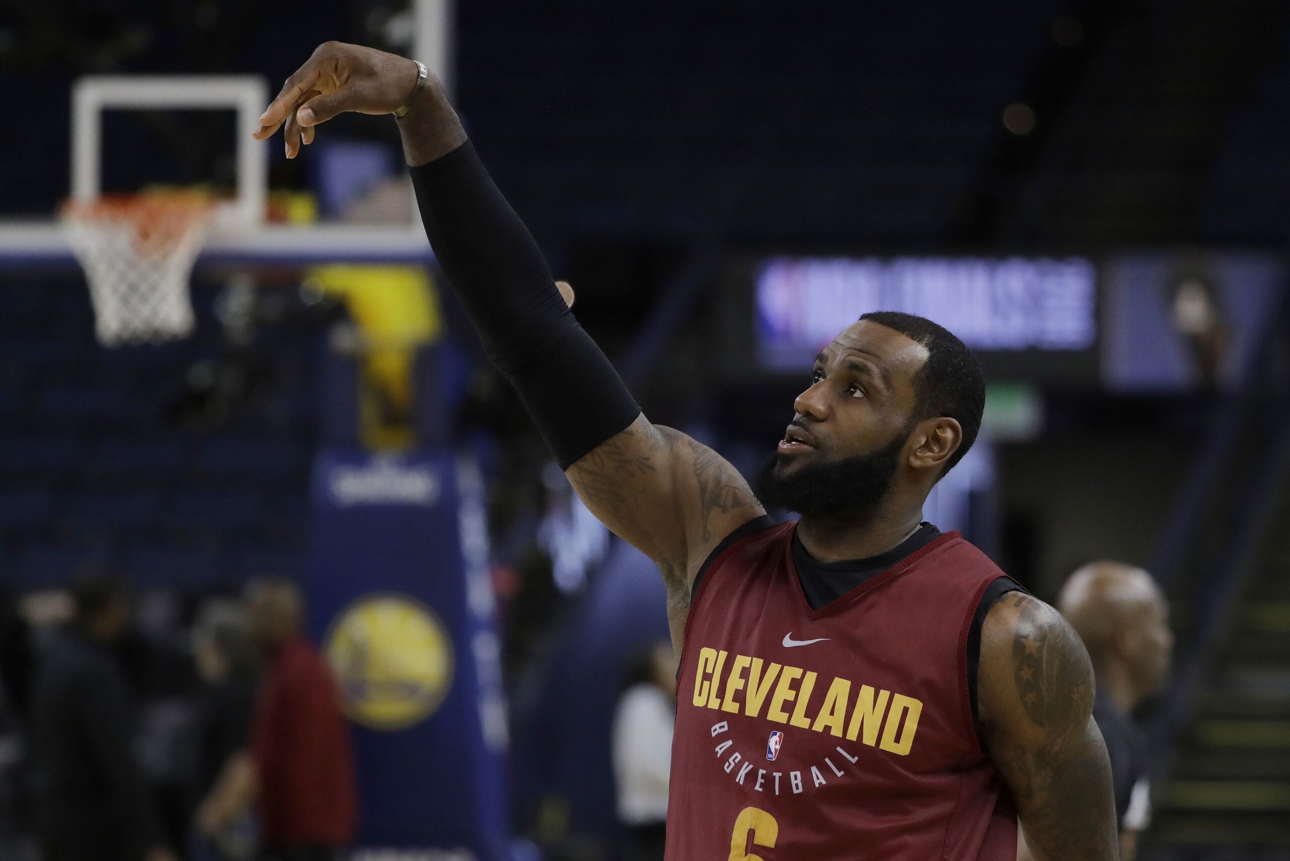 Cleveland Cavaliers' LeBron James follows through on a shot during an NBA basketball practice, Wednesday, May 30, 2018, in Oakland, Calif. The Cavaliers face the Golden State Warriors in Game 1 of the NBA Finals on Thursday in Oakland. (AP Photo/Marcio Jose Sanchez)