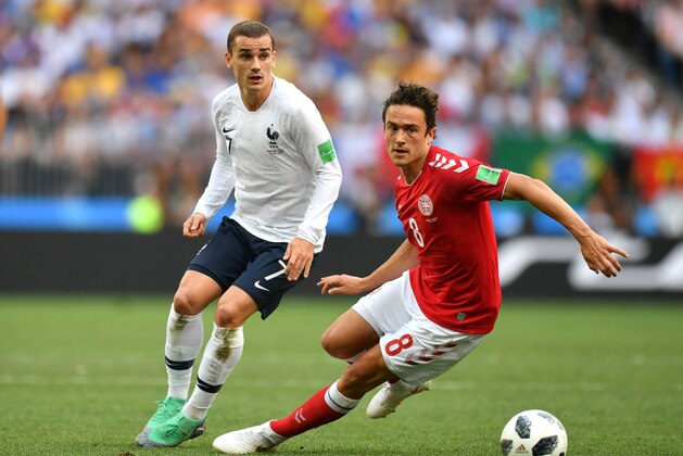 MOSCOW, RUSSIA - JUNE 26:  Antoine Griezmann of France battles for the ball with Thomas Delaney of Denmark during the 2018 FIFA World Cup Russia group C match between Denmark and France at Luzhniki Stadium on June 26, 2018 in Moscow, Russia.  (Photo by Dan Mullan/Getty Images)