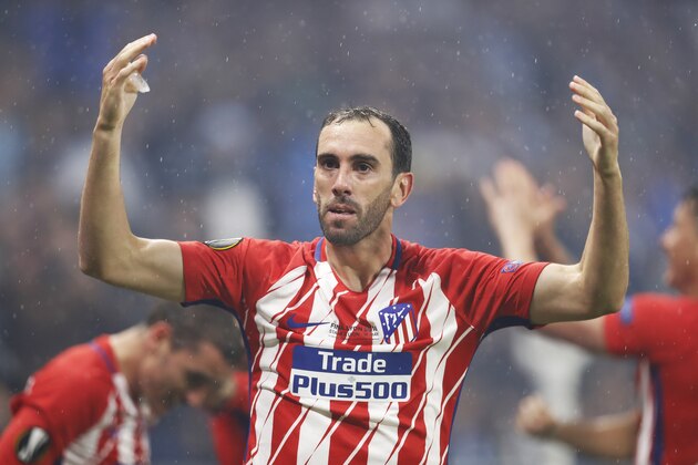 LYON, FRANCE - MAY 16: Diego Godin of Athletico Madrid celebrates after Antoine Griezmann of Athletico Madrid scores his second goal during the UEFA Europa League Final between Olympique de Marseille and Club Atletico de Madrid at Stade de Lyon on May 16, 2018 in Lyon, France. (Photo by Ian MacNicol/Getty Images)