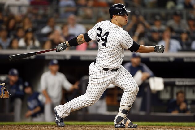 New York Yankees' Gary Sanchez hits a three-RBI double during the eighth inning of a baseball game against the Tampa Bay Rays, Friday, June 15, 2018, in New York. (AP Photo/Adam Hunger)