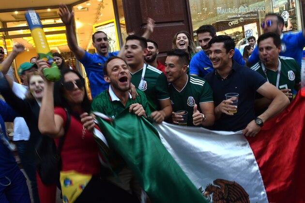 Mexico's fans cheer on Nikolskaya street in Moscow on June 26, 2018, during the Russia 2018 World Cup football tournament (Photo by Vasily MAXIMOV / AFP)        (Photo credit should read VASILY MAXIMOV/AFP/Getty Images)