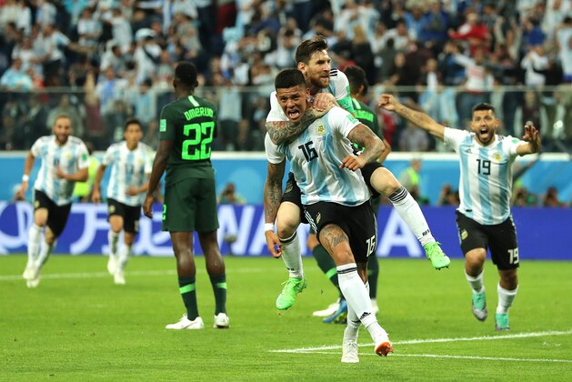 SAINT PETERSBURG, RUSSIA - JUNE 26:  Marcos Rojo of Argentina celebrates after scoring his team's second goal with teammate Lionel Messi  during the 2018 FIFA World Cup Russia group D match between Nigeria and Argentina at Saint Petersburg Stadium on June 26, 2018 in Saint Petersburg, Russia.  (Photo by Richard Heathcote/Getty Images)