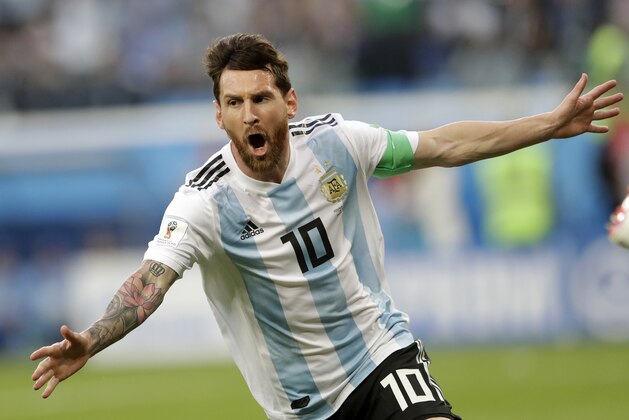 Argentina's Lionel Messi celebrates after scoring the opening goal of his team during the group D match between Argentina and Nigeria, at the 2018 soccer World Cup in the St. Petersburg Stadium in St. Petersburg, Russia, Tuesday, June 26, 2018. (AP Photo/Petr David Josek)