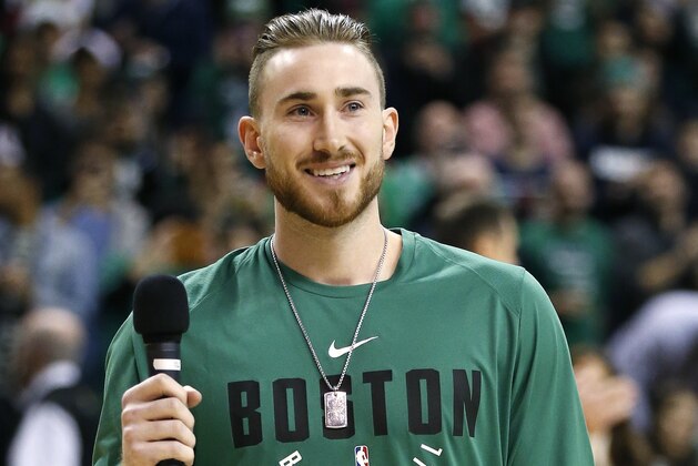 Boston Celtics Gordon Hayward addresses the crowd before an NBA basketball game against the Washington Wizards in Boston, Monday, Dec. 25, 2017. (AP Photo/Michael Dwyer)