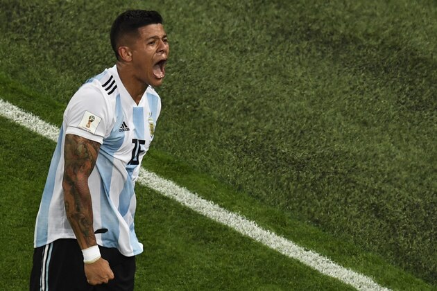 TOPSHOT - Argentina's defender Marcos Rojo celebrates scoring a goal during the Russia 2018 World Cup Group D football match between Nigeria and Argentina at the Saint Petersburg Stadium in Saint Petersburg on June 26, 2018. (Photo by Paul ELLIS / AFP) / RESTRICTED TO EDITORIAL USE - NO MOBILE PUSH ALERTS/DOWNLOADS        (Photo credit should read PAUL ELLIS/AFP/Getty Images)
