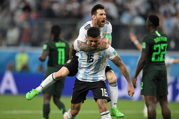 TOPSHOT - Argentina's defender Marcos Rojo (lower) celebrates his goal with Argentina's forward Lionel Messi during the Russia 2018 World Cup Group D football match between Nigeria and Argentina at the Saint Petersburg Stadium in Saint Petersburg on June 26, 2018. (Photo by GABRIEL BOUYS / AFP) / RESTRICTED TO EDITORIAL USE - NO MOBILE PUSH ALERTS/DOWNLOADS (Photo credit should read GABRIEL BOUYS/AFP/Getty Images) TOPSHOT - Argentina's defender Marcos Rojo (lower) celebrates his goal with Argentina's forward Lionel Messi during the Russia 2018 World Cup Group D football match between Nigeria and Argentina at the Saint Petersburg Stadium in Saint Petersburg on June 26, 2018. (Photo by GABRIEL BOUYS / AFP) / RESTRICTED TO EDITORIAL USE - NO MOBILE PUSH ALERTS/DOWNLOADS (Photo credit should read GABRIEL BOUYS/AFP/Getty Images)