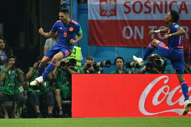 Colombia's forward Falcao (L) celebrates after scoring their second goal during the Russia 2018 World Cup Group H football match between Poland and Colombia at the Kazan Arena in Kazan on June 24, 2018. (Photo by SAEED KHAN / AFP) / RESTRICTED TO EDITORIAL USE - NO MOBILE PUSH ALERTS/DOWNLOADS        (Photo credit should read SAEED KHAN/AFP/Getty Images)