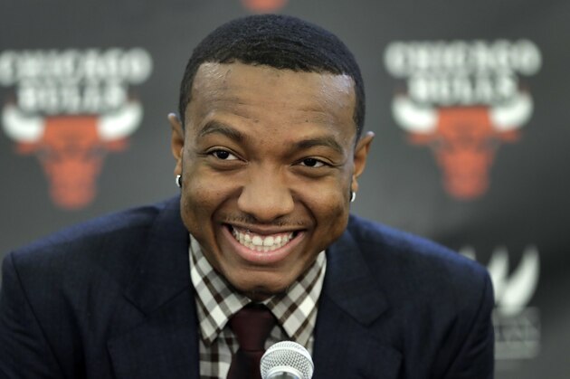 The Chicago Bulls first round draft pick, Wendell Carter Jr., smiles during an NBA basketball news conference where he was introduced to Chicago reporters Monday, June 25, 2018, in Chicago. (AP Photo/Charles Rex Arbogast)