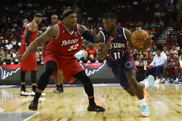 HOUSTON, TX - JUNE 22:  Nate Robinson #11 of Tri State drives against Rashad McCants #32 of Trilogy during week one of the BIG3 three on three basketball league at Toyota Center on June 22, 2018 in Houston, Texas.  (Photo by Ronald Martinez/BIG3/Getty Images)