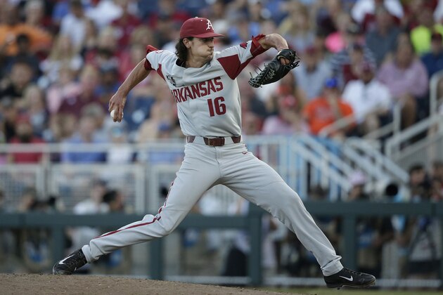 Arkansas pitcher Blaine Knight (16) throws against Oregon State during the fifth inning of Game 1 of the NCAA College World Series baseball finals in Omaha, Neb., Tuesday, June 26, 2018. (AP Photo/Nati Harnik)
