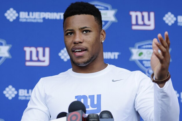 New York Giants running back Saquon Barkley speaks at a news conference at NFL football rookie camp, Friday, May 11, 2018, in East Rutherford, N.J. (AP Photo/Frank Franklin II)