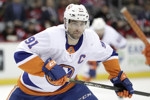 New York Islanders center John Tavares skates against the New Jersey Devils during the first period of an NHL hockey game, Saturday, March 31, 2018, in Newark, N.J. (AP Photo/Julio Cortez)