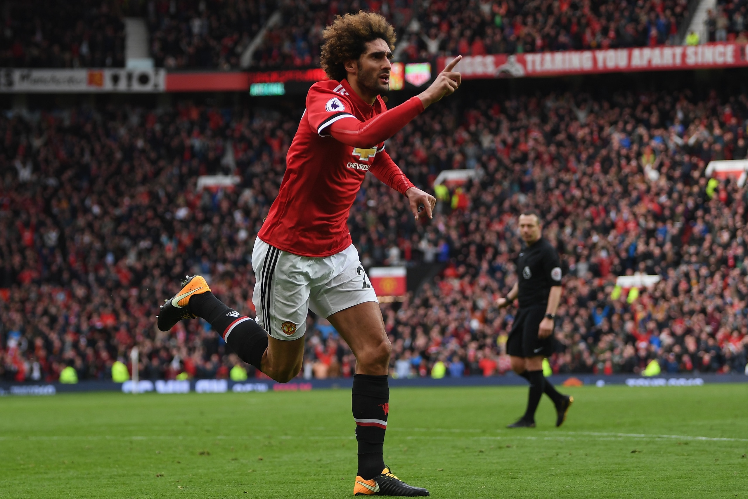 MANCHESTER, ENGLAND - APRIL 29:  Marouane Fellaini of Manchester United celebrates after scoring his sides second goal during the Premier League match between Manchester United and Arsenal at Old Trafford on April 29, 2018 in Manchester, England.  (Photo by Shaun Botterill/Getty Images)